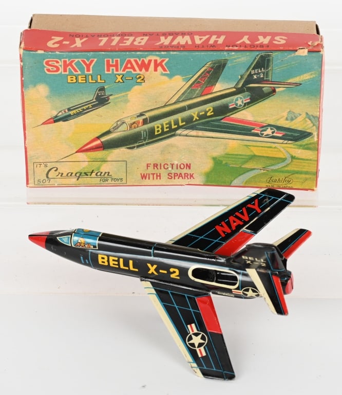 JAPAN TIN FRICTION SKY HAWK BELL X-2 JET w/ BOX: All original with working friction motor. Nice graphics on the original box. Missing rear wheel. 7" Excellent