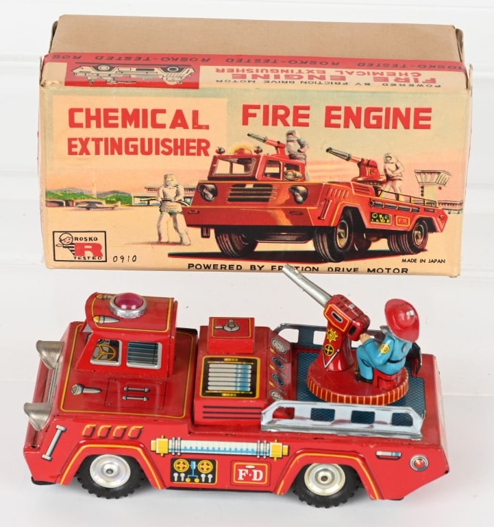 JAPAN TIN FRICTION CHEMICAL FIRE TRUCK w/ BOX: All original with working friction motor. Nice graphics on the original box. 7 1/4" Excellent