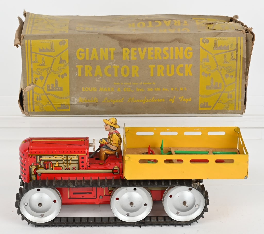 MARX GIANT REVERSING TRACTOR TRUCK w/ BOX: Marx Giant Reversing tractor truck is complete and original. The tools are still on card in bed. Windup worked properly when tested. The original box is worn and stained. 14" Excellent