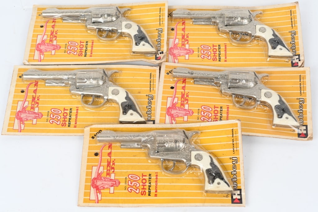 5- HUBLEY TEXAN JR. 250 SHOT CAP GUNS, SEALED: 5- Texan Jr. cap guns sealed on the original cards. Old store stock. 10", Excellent-Near Mint