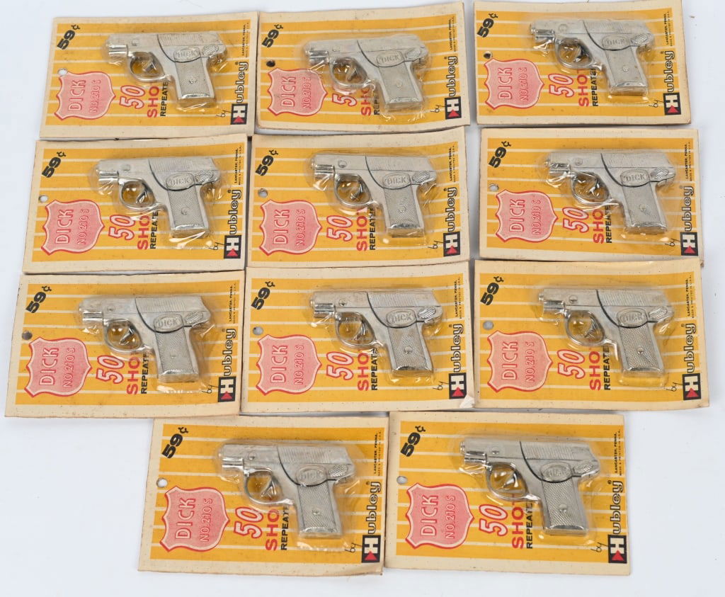 11- HUBLEY DETECTIVE "DICK" CAP GUNS SEALED: 11 Dick cap guns sealed on the original cards. Old Store Stock. 7", Excellent-Near Mint