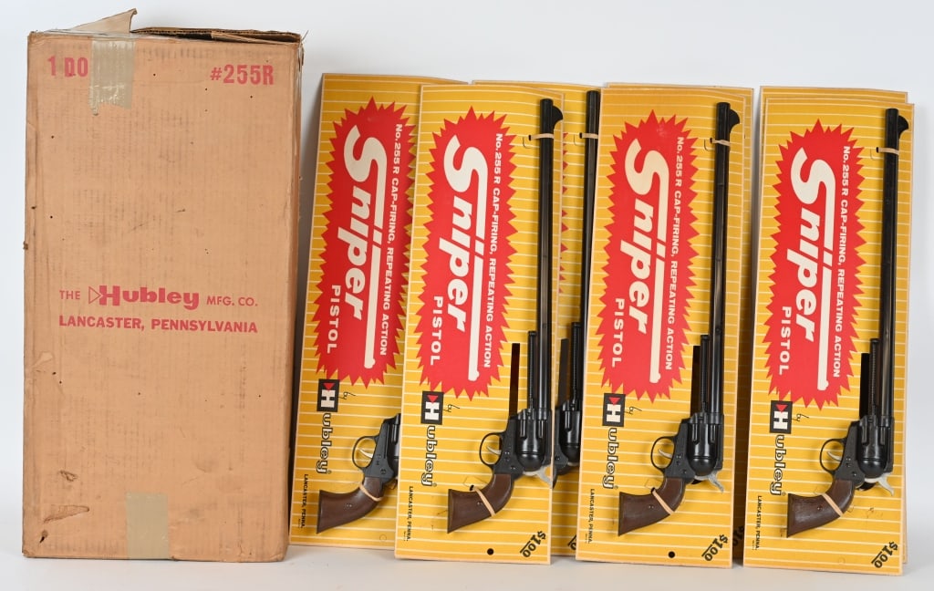 7- HUBLEY 255R SNIPER CAP GUNS, CARDS, BOX: Lot of Old Store Stock Hubley Sniper cap pistols on the original cards with the original shipping box. All worked when tested. Scarce cap pistols resemble Colt Buntlines. Guns are 22" long. Excellent-