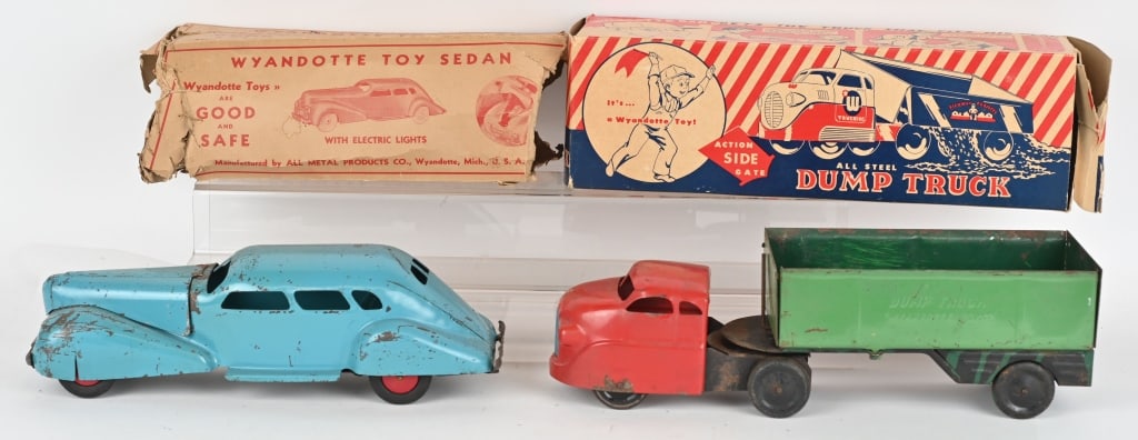 WYANDOTTE SEDAN & SIDE DUMP TRUCK w/ BOXES: Lot includes 17" pressed steel side dump truck with rust and wear. The original box is very nice and is for the litho'd version of this truck. 2. 15", Scarce electric light sedan. Original condition. 