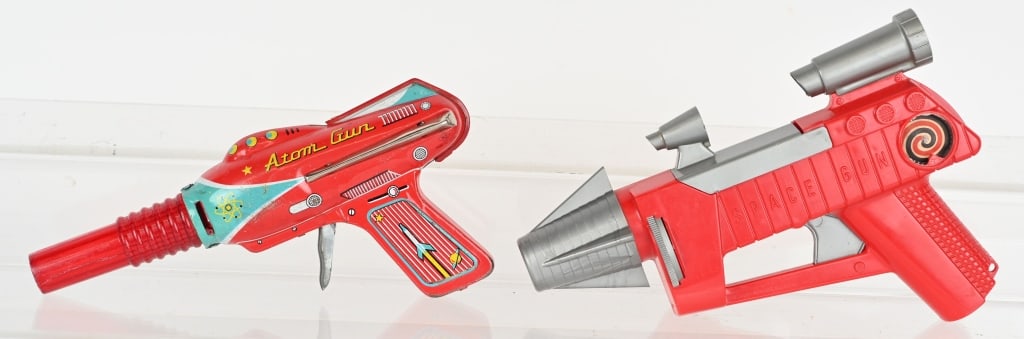 LOT OF SPACE GUNS: Includes Atom Gun all original not working properly. Space Gun all original and works. One of the guns front pieces is cracked. Very Good- Excellent