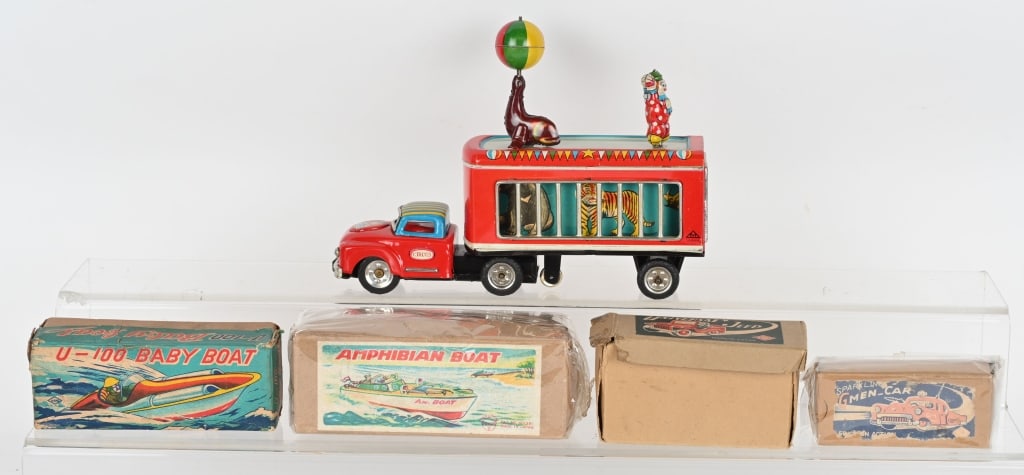 JAPAN CIRCUS TRUCK & MORE: Great looking truck with nice graphics. Friction works. Comes with 4 original Boxes for Japanese toys. truck measures 8" Excellent