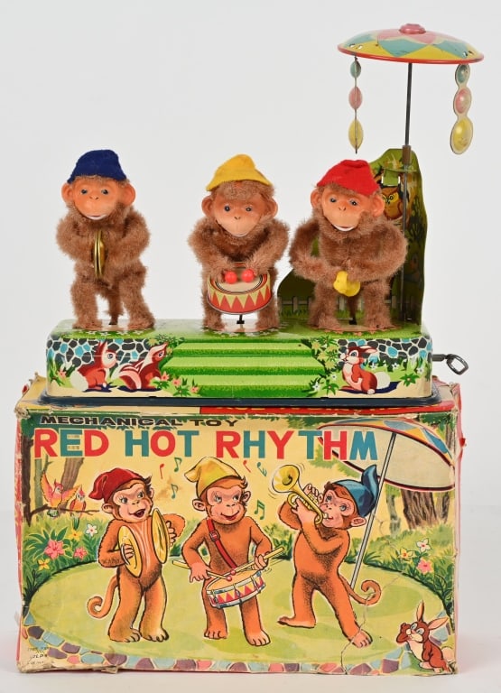 JAPAN WINDUP RED HOT RHYTHEM w/ BOX: All original and works. Still has umbrella. Windup works. Boxed 11" Excellent