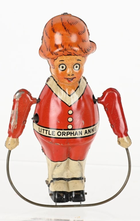 MARX TIN WINDUP LITTLE ORPHAN ANNIE SKIPPING ROPE: All original with nice colors. Works. 5"