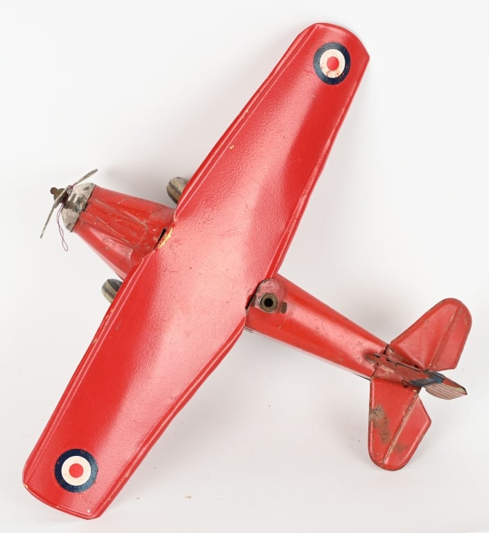 PREWAR JAAPN TIN WINDUP AIRPLANE: Nice early airplane. Wing has been replaced and looks great. Windup works. 9 1/2" Wingspan. Excellent