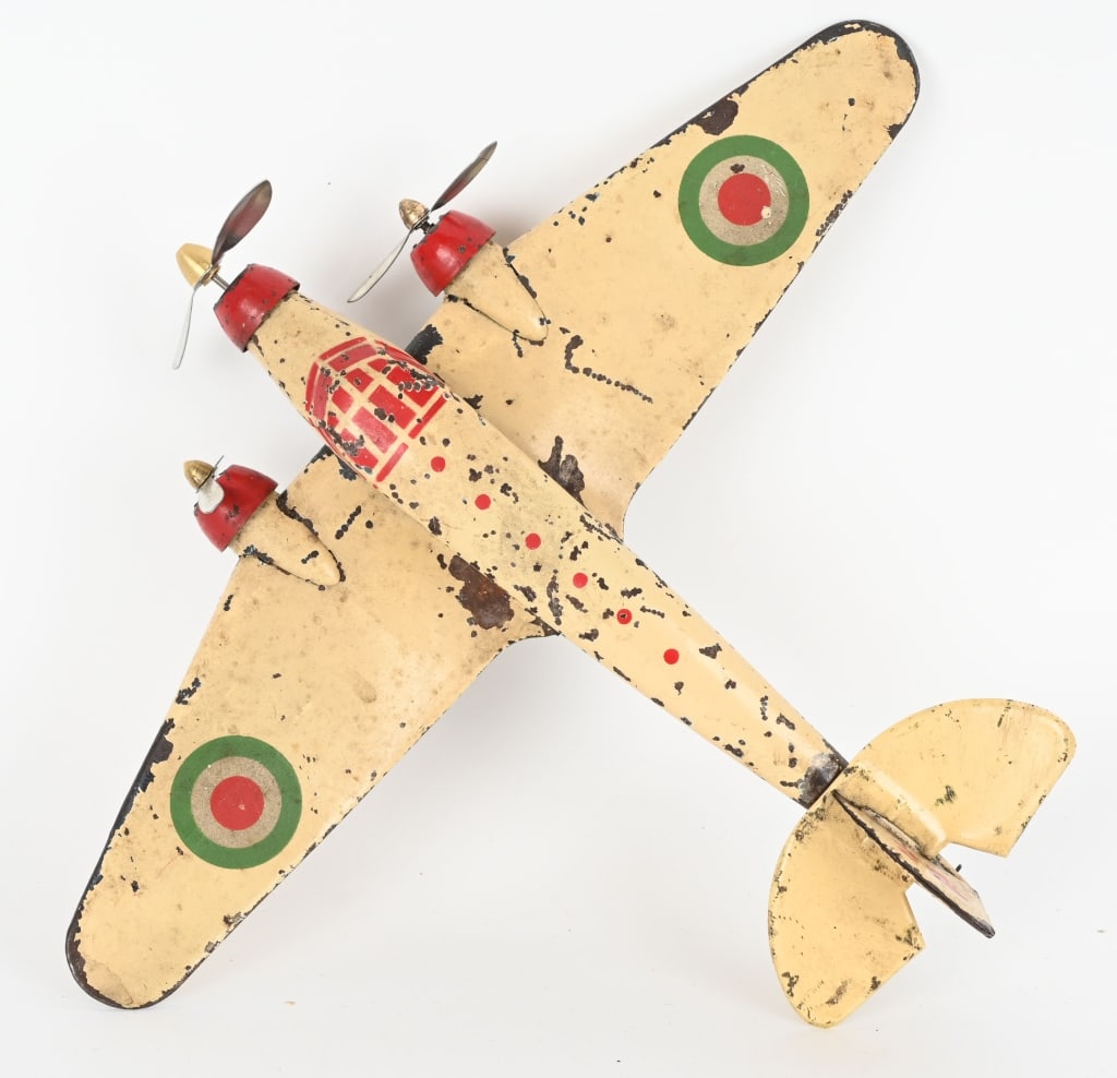 INGAP TIN WINDUP S81 AIRPLANE: Original and complete. Has some wear. Windup works. Props replaced. 12 1/2" Wingspan. Very Good