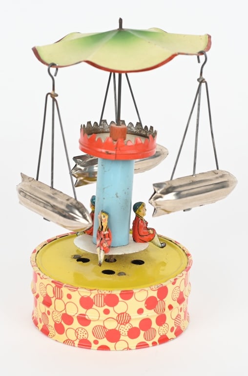 GERMAN TIN WINDUP ZEPPELIN GO ROUND (1 of 4)