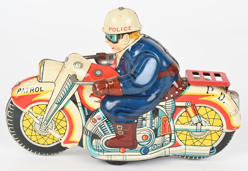 JAPAN TIN FRICTION POLICE MOTORCYCLE: Nice all original tin friction Police Motorcycle. Great colors and details. Friction works. 8" Excellent