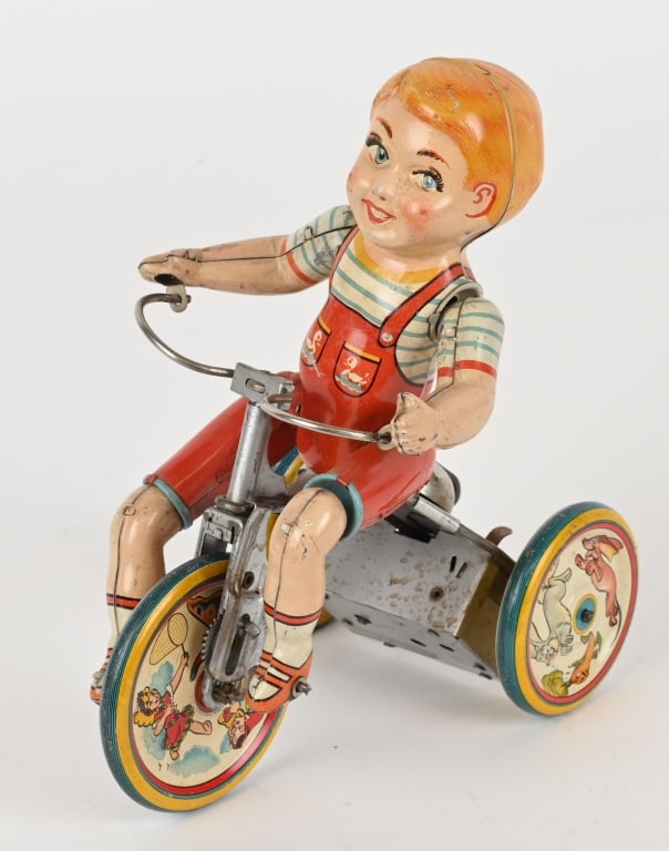 UNIQUE ART TIN WINDUP KIDDY CYCLIST (1 of 4)