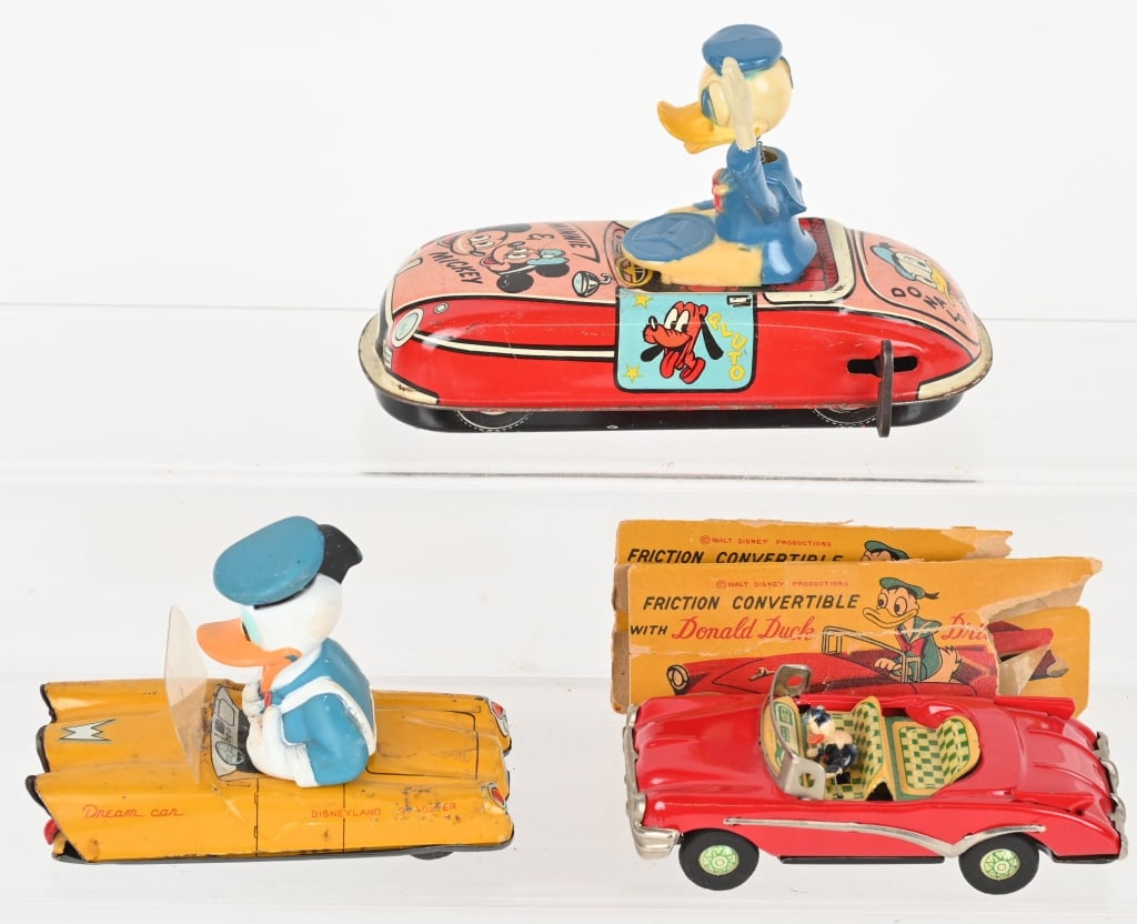 3- TIN DONALD DUCK TOYS (1 of 6)