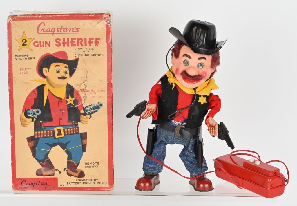 JAPAN BATTERY OP CRAGSTAN 2 GUN SHERIFF w/ BOX: Cragstan's 2 Gun Sheriff with the original box. Bright colors and clean. Worked when tested. Includes colorful original box that has been shrink wrapped. Excellent