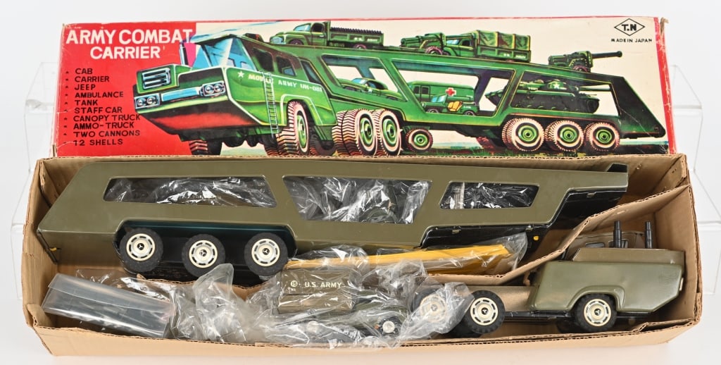 JAPAN TIN FRICTION ARMY COMBAT CARRIER w/ BOX: All original and complete with accessory vehicles. Looks never played with. Friction works. Boxed 20" Excellent