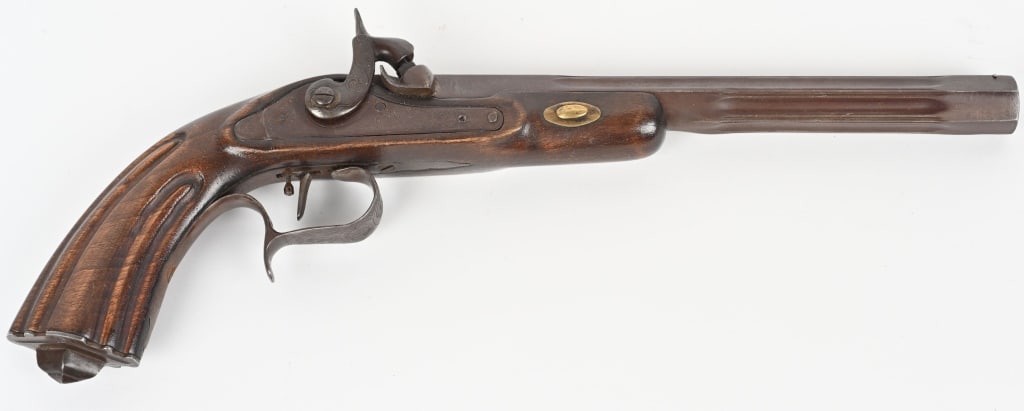BELGIAN PERCUSSION BELT PISTOL: SERIAL NUMBER: NSN. BARREL: 9". CALIBER .44. Quality percussion pistol. Features fluted octagon barrel, engraved lock, hammer, trigger guard and barrel breech. Walnut stock is fluted at the grip. COND