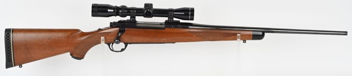 RUGER M77 BOLT ACTION WITH SCOPE IN 257 ROBERTS
