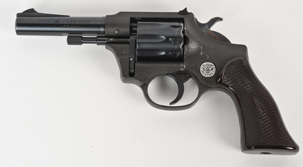 HIGH STANDARD SENTINEL MODEL R-101 .22 REVOLVER.: SERIAL NUMBER: 970959. BARREL: 4". CALIBER: 22 LR. MANUFACTURED: 1950s. This model that was first introduced in 1955. It is a nine shot .22 rim fire double action revolver with a 5" barrel, fixed sigh