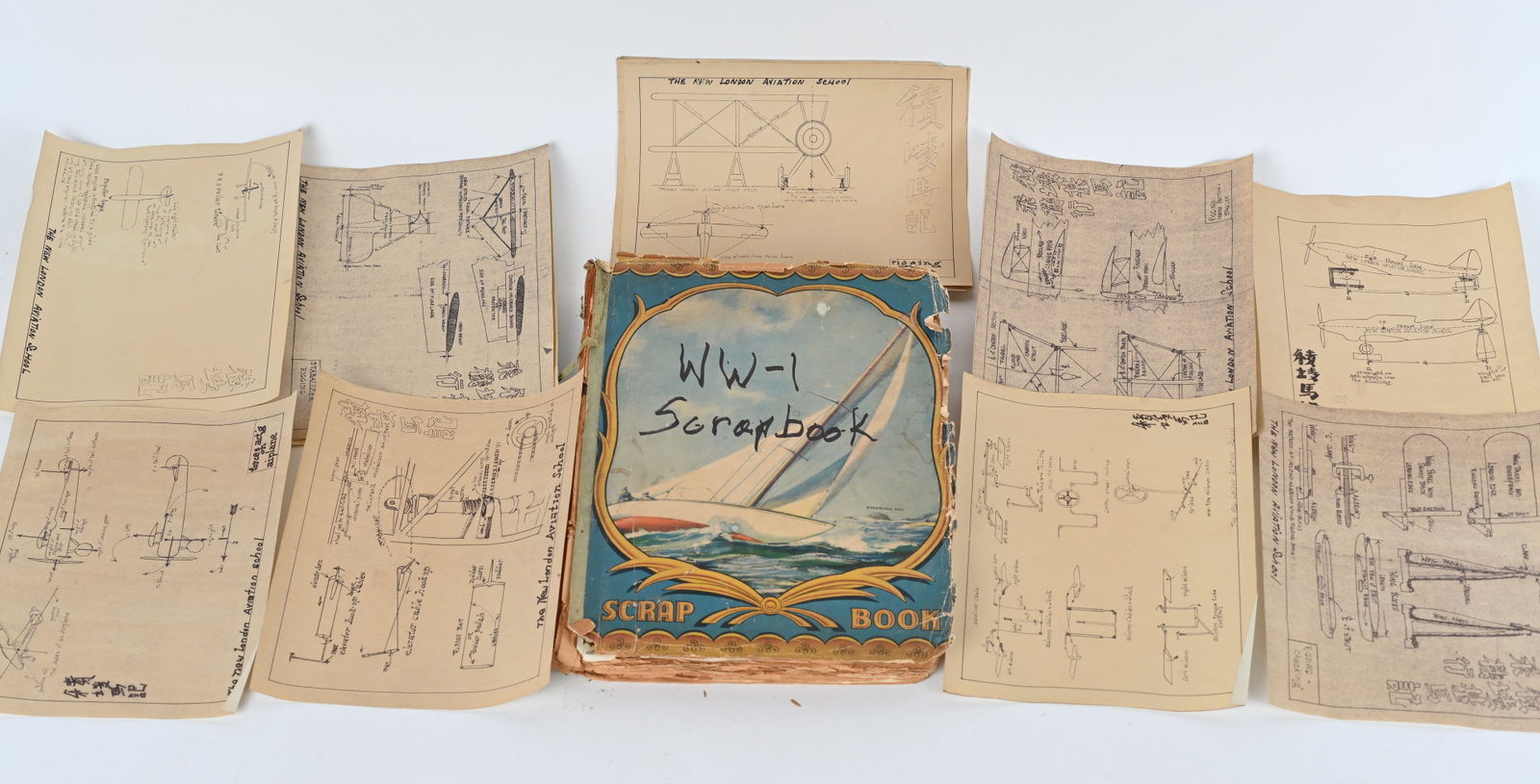 WW1 PHOTO ALBUM SCRAPBOOK & WWII PLANE BLUEPRINTS: WW1 & WWII Ephemera lot to include 1) Large Scrapbook with newspaper articles and photos. 2) New London Plane Blueprints. All are excellent. 