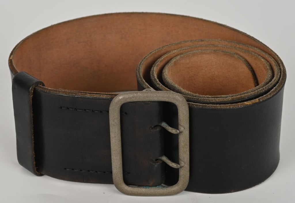 WWII NAZI OFFICER'S BELT & OPEN CLAW BELT BUCKLE: Nice clean example. Belt is 70mm wide by 105cm in length with seven pairs of buckling holes. Floating retaining loop is present. Excellent. Military belts and their corresponding buckles date bac