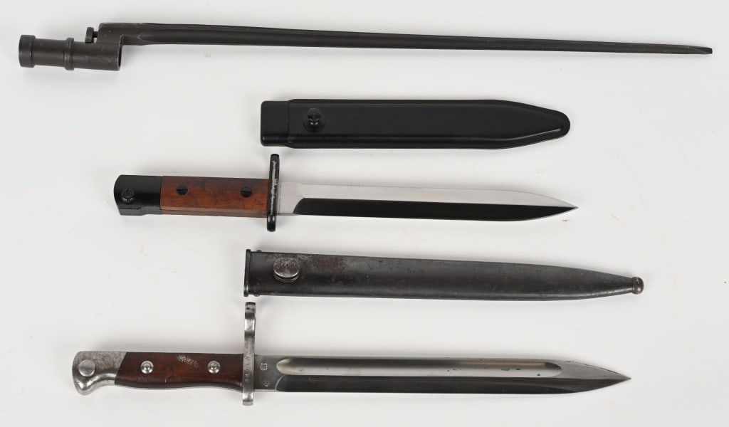 BAYONET LOT CHILEAN SOVIET DANISH W SCABBARDS: Lot of Bayonets to include 1) Unissued Danish Madsen M-1947 Bayonet. This is a lovely, unissued example of the Colombian Contract Madsen Bayonet. The bayonet is for use with the .30-06 caliber Ma