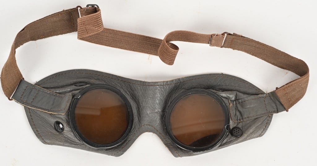 WWII NAZI GERMAN GENERAL PURPOSE GOGGLES WW2: Goggles consist of a one piece, pliable, molded leather frame with circular glass lenses. Headband is still very pliable. Excellent.