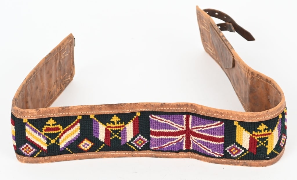 WW1 BRITISH MONEY BELT NEEDLEPOINT OVER LEATHER: WW1 British Embroidered Money Belt featuring Cross Flags with Crowns and the Union Jack measuring roughly 32 inches long and is needlepoint over leather. Excellent. 
