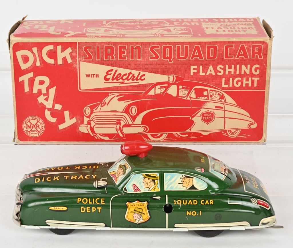 MARX TIN WINDUP DICK TRACY CAR w/ BOX: Nice looking Dick Tracy Squad Car. Desirable large windup version with eclectic light. All original with great colors and graphics. Windup works. Comes with Box. 11" Excellent