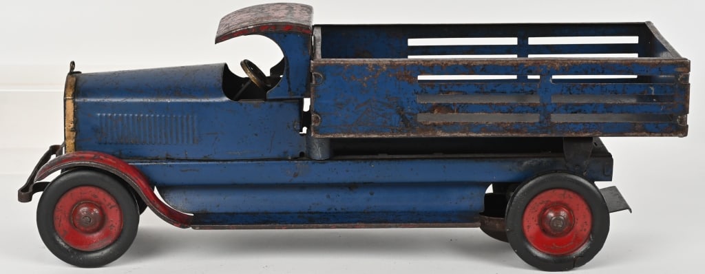 TURNER PRESSED STEEL C CAB STAKE BED TRUCK: All original and complete. Has decent paint. Large impressive truck. Friction mech not working. 22" Very Good