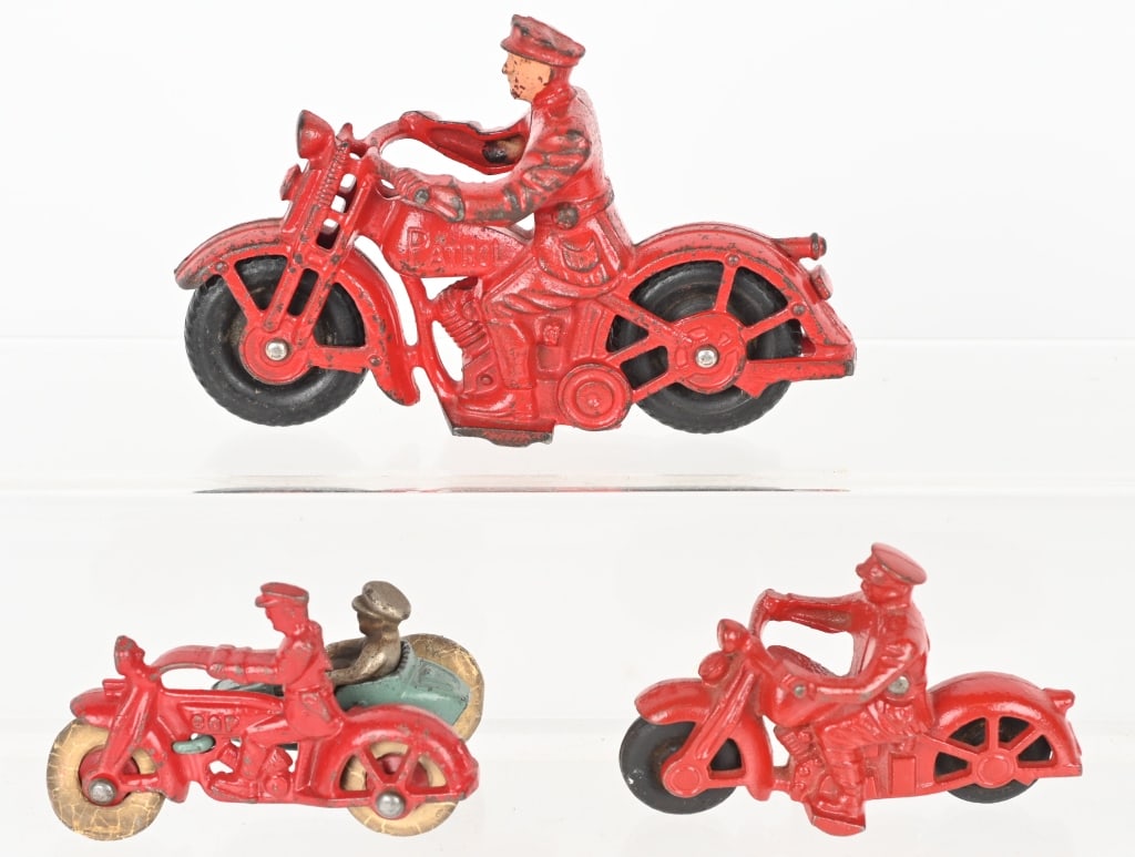 3- HUBLEY CAST IRON MOTORCYCLES: Lot includes : 1. 6 1/2" Solo motorcycle, nice all original with no cracks or repairs. 2. 4" Solo motorcycle, excellent original with no cracks or repairs, 3. 4" Motorcycle with sidecar and rider. Exc
