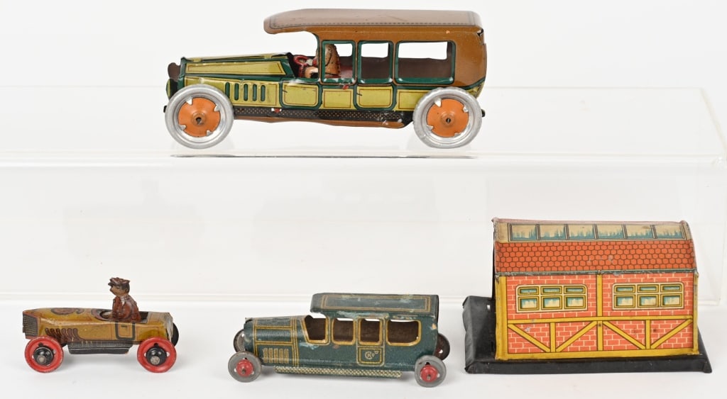 3- EARLY GERMAN TIN PENNY TOYS: Lot includes: 1. 5 1/4" George Levy sedan, Excellent, 2. 2 1/2" No. 6 Race Car, Very Good-Excellent, 3. 3" Fischer Sedan with Garage, very Good
