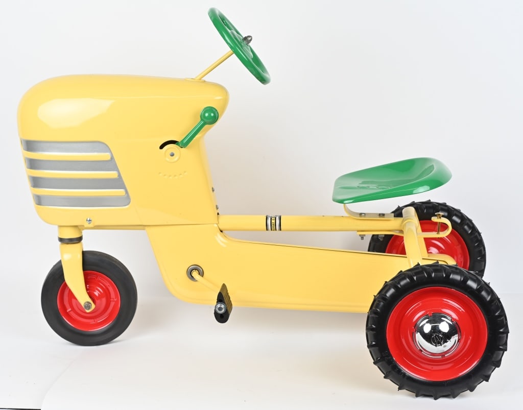 MURRY PEDAL TRACTOR: Professionally restored Murry pedal Tractor. Has great looking paint. Very nice looking Tractor. 38" Excellent