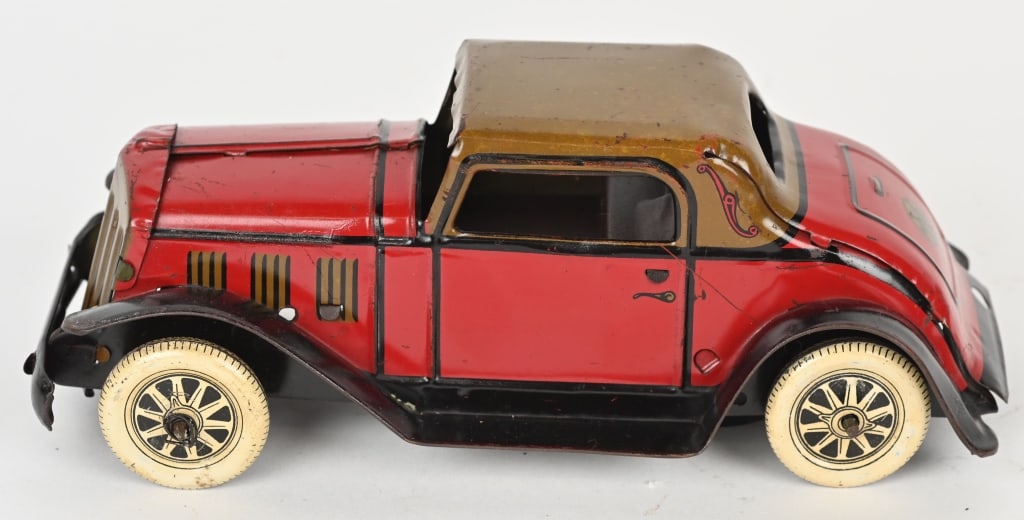 MARX TIN WINDUP SIREN FIRE CHIEF ROADSTER: All original in great shape. Friction works. 8" Excellent