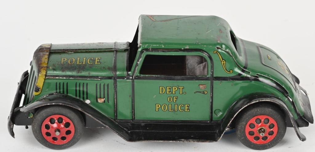MARX TIN WINDUP POLICE DEPT ROADSTER: All original with some minor wear. Friction works. 8" very Good-Excellent