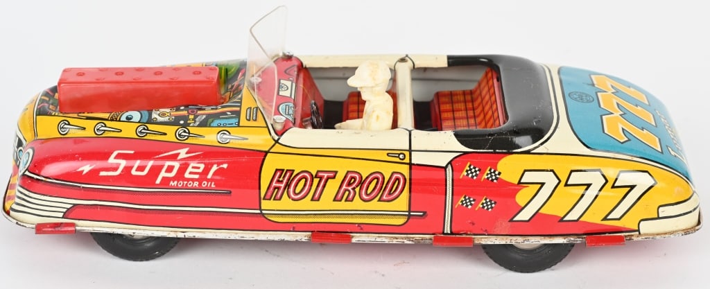 MARX TIN FRICTION SUPER HOT ROD: Nice looking car with great graphics. friction works. Windshield replaced. There is some touchup inside the cab. 11" Excellent
