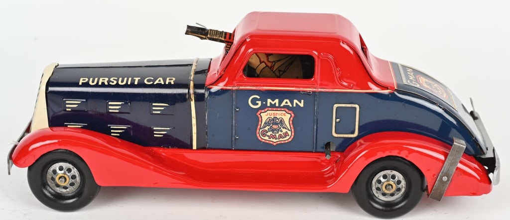 MARX TIN WINDUP G-MAN CAR: great looking car that has some professional restoration to red. Looks fantastic. Windup works. 14" Excellent