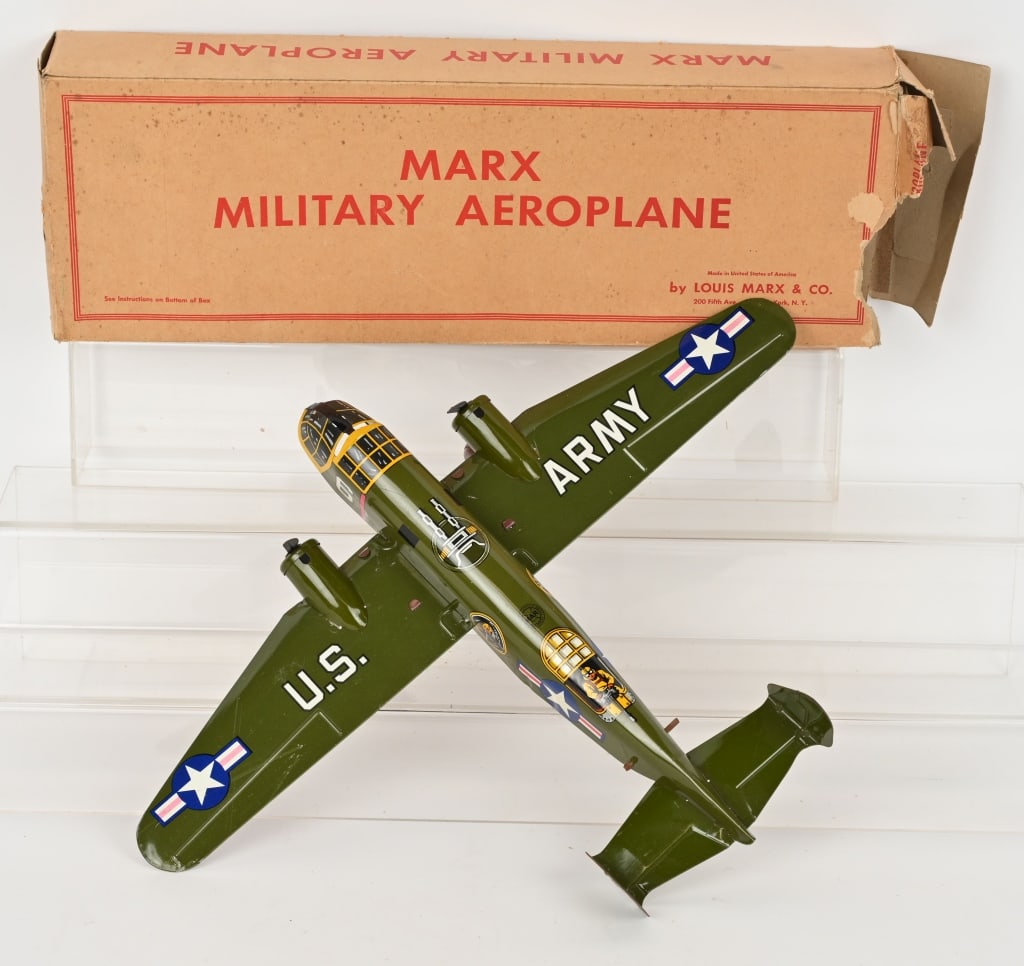 MARX TIN WINDUP MILITARY AIRPLANE w/ BOX: Marx tin windup Military Airplane. All original and not used much if any. Windup works. Original box has insert. Missing end flap. 18" Excellent