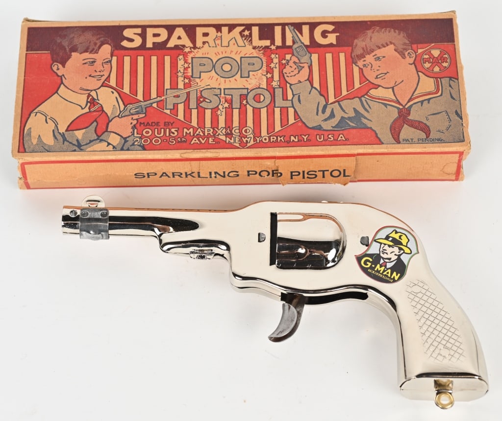 MARX G-MAN SPARKLING POP GUN w/ BOX: Chrome gun with decal. Looks like new condition. Decal possibly replaced. Boxed 9" Excellent