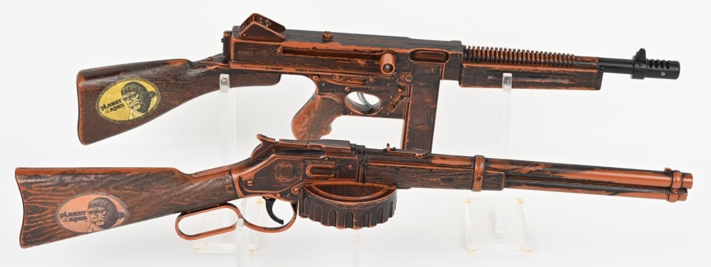 2- PLANET OF THE APES GUNS: Both all original in great shape. The muzzle has been glued on one of the guns. Largest 25" Excellent