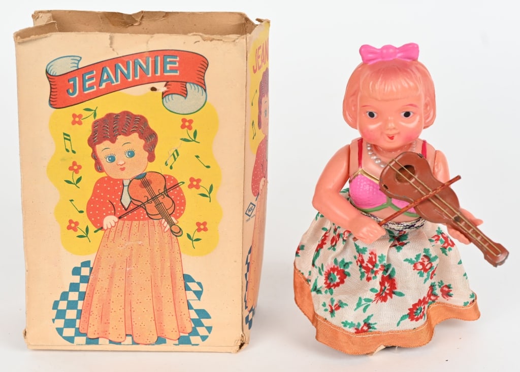 JAPAN CELLULOID WINDUP JEANNIE VIOLIN PLAYER: All original and looks never played with. Windup works. Boxed 6" Excellent