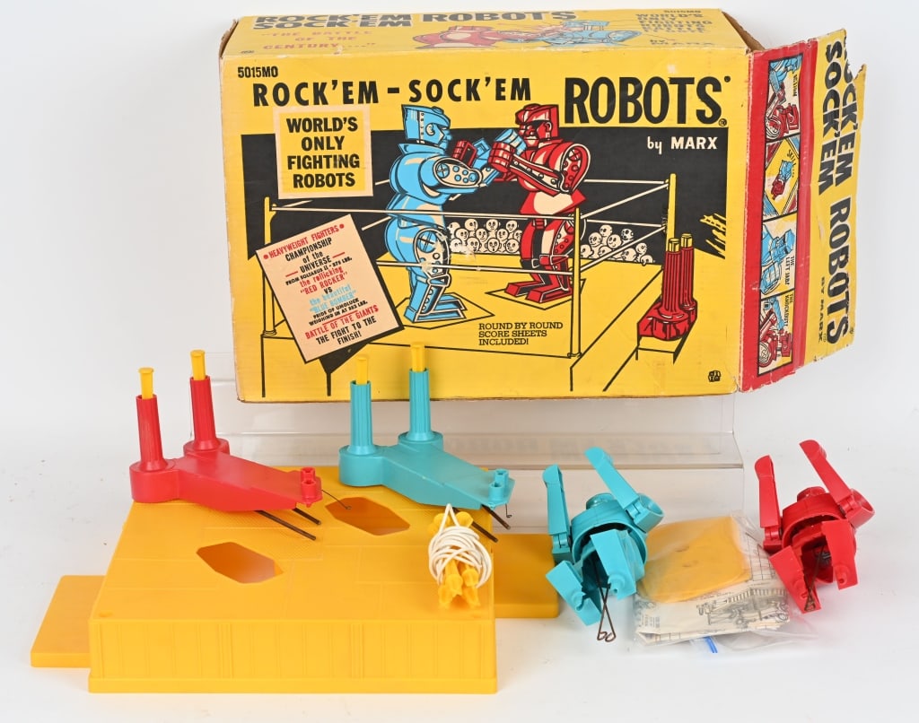 MARX ROCK' EM SOCK' EM ROBOTS w/ BOX: Marx Rock' Em Sock' Em Robots. Made in the USA. Original set that is complete, unassembled and appears to be unplayed with. With original colorful box. 20" Excellent