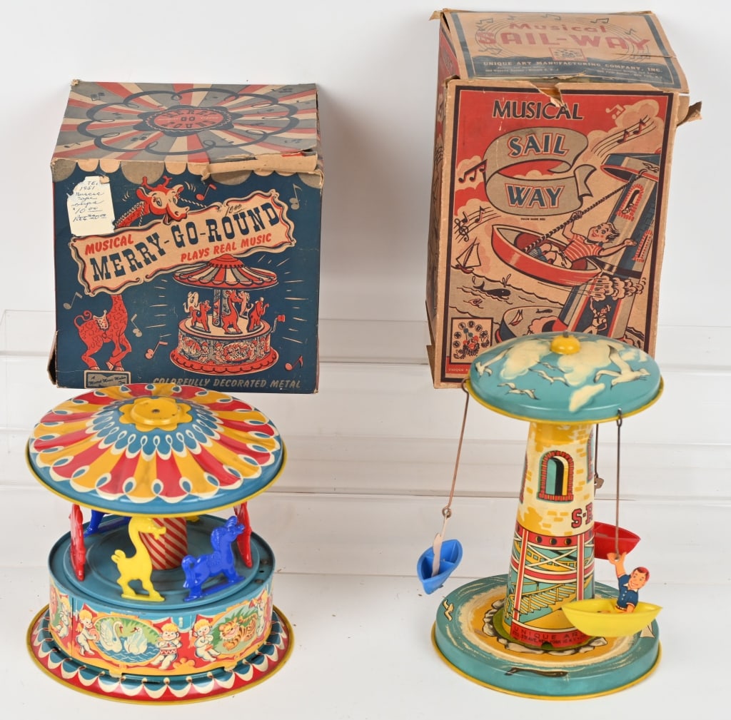MERRY GO ROUND & SAIL WAY w/ BOXES: Unique Art tin windup Sail Way and Mattel Crank Merry Go Round. Both never played with. Boxed 9" Excellent