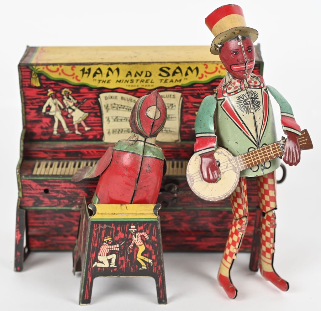 STRAUSS TIN WINDUP HAM & SAM BAND: All original and complete. Has some wear. Windup not working. 7" Very Good