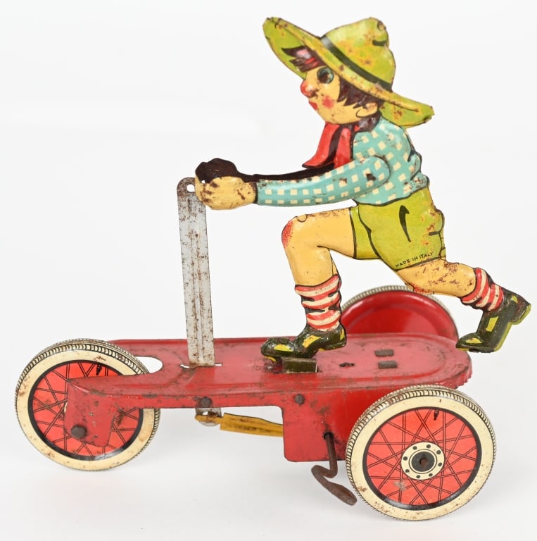 ITALY TIN WINDUP FARM BOY ON SCOOTER: All original with some wear. Windup not working. 6 1/2" Very Good-Excellent
