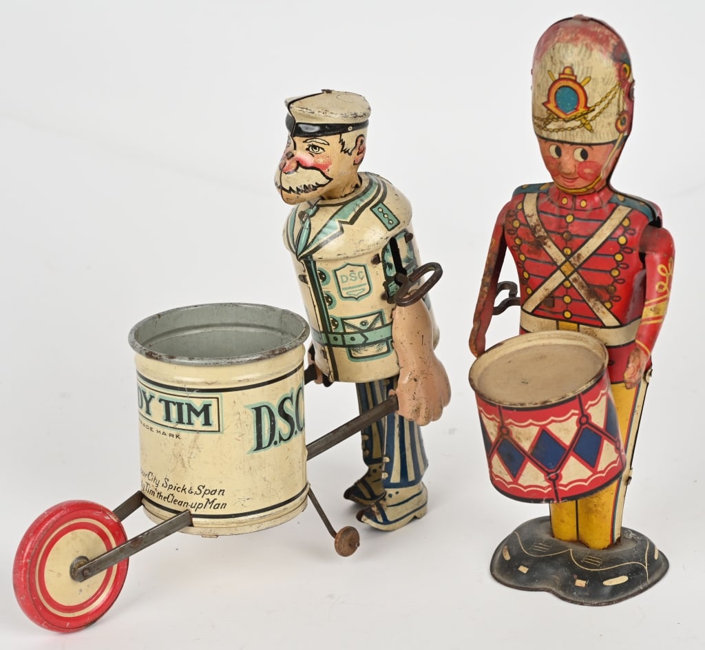 MARX TIN WINDUP TIDY TIM & GEORGE THE DRUMMER: Tidy Tin is all original and in nice working condition. George the Drummer not working with broken drum sticks. Largest8 1/2" Very Good-Excellent