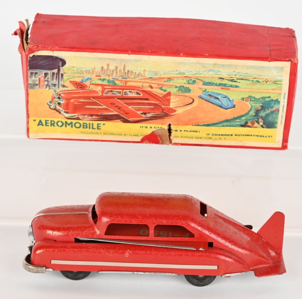 GERMAN TIN WINDUP AEROMOBILE w/ BOX: German tin windup Aeromobile. All original and complete. Litho has rough texture with spidering. Still displays well. Windup works. Boxed 8" Very Good-Excellent