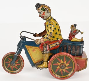 FISCHER TIN WINDUP CLOWNS ON MOTORCYCLE