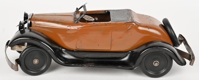 FOUR-WAY CLOCKWORK FORD ROADSTER