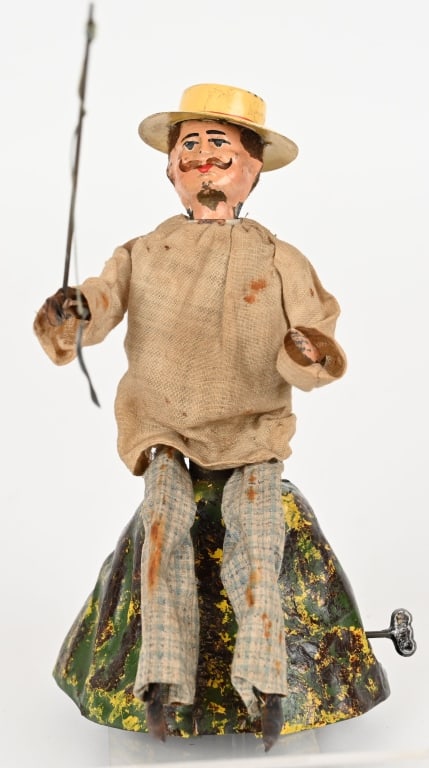 FERNAND MARTIN THE PERFECT FISHERMAN: Fernand Martin tin windup "Au Parfait Pecheur" The Perfect Fisherman. All original and complete. In very nice condition. Windup works. and Fisherman moves his fishing pole around. Hat is repainted. 8