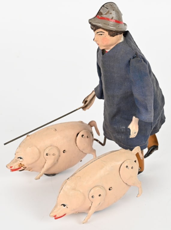 FERNAND MARTIN PIG MERCHANT: Fernand Martin windup Pig Merchant. Has some restoration. Windup works. A very scarce toy. 7 1/2" Excellent